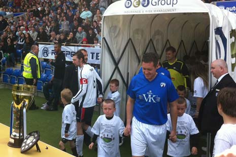 Jamie Walker leads out the teams at the B2net