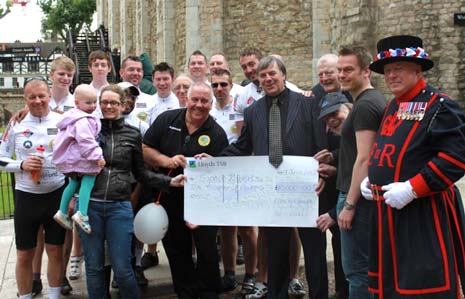 DAY 4 - Presenting a cheque to Sophie Roberts. One of the reasons for the ride and what keeps the team going...