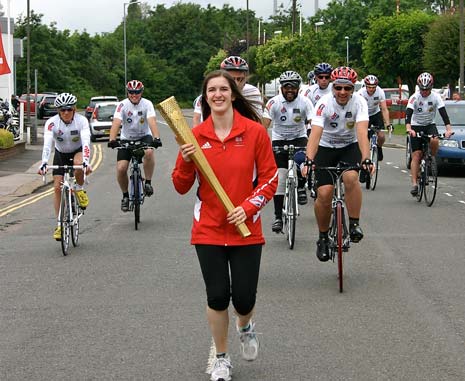 Chesterfield Olympian Ellie Koyander, carrying her Olympic Torch, led the team off after their break