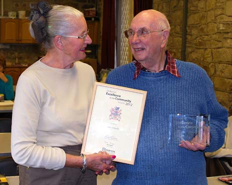 Retired businessman John Wardle of Ashover has been awarded one of Derbyshire's highest honours for his long and distinguished voluntary service to the community.