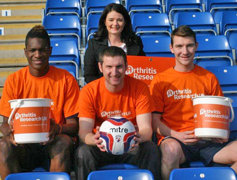Chesterfield FC players Craig Clay and Armand Gnanduillet are pictured with Kathryn Leverett (Arthritis Research UK Senior Regional Fundraising Manager) and  David Fisher (Arthritis Research UK Regional Fundraising Manager)