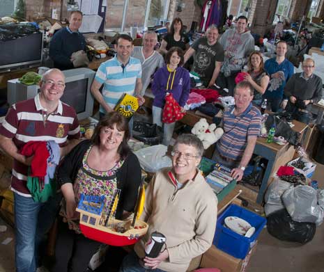 A team from Lloyds TSB Commercial Banking has volunteered at the National Hereditary Breast Cancer Helpline charity in Chesterfield, to organise donated items for the charity's shops, after the organisation received funding support worth £15,000 from the bank to finance its growth.