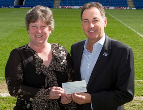 Badges produced to commemorate Chesterfield's appearance in the final of the Johnstone's Paint Trophy final have raised a four-figure sum for Ashgate Hospice. 
