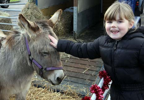 Antonia Spicer-Mann (5) with Onky the donkey