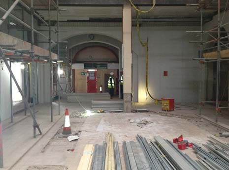 The site is currently stripped right back, with the middle ripped out and the atrium about to go in, replacing the flat roof