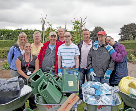 Friends and volunteers of Eastwood Park celebrate £10,000 funding for the Community Garden in Hasland's Eastwood Park