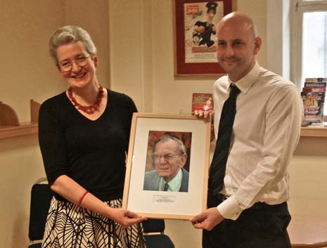 Former Theatre Manager Liz Woodall and Cllr Ken Huckle with the commemorative photograph of beloved Theatre Manager, Derek Coleman