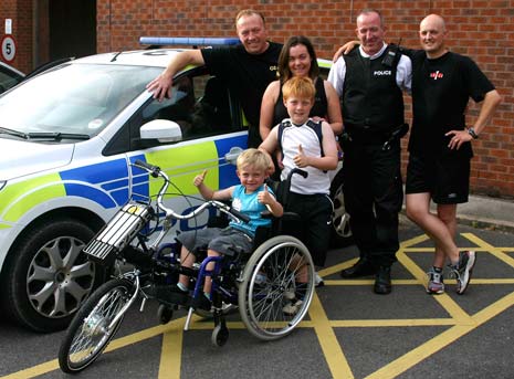 Thomas and family with Ozbox founder Steve Osbaldeston MBE