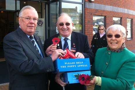 Barrie Hubbard, Chairman of Chesterfield FC buys the first Poppyof the Derbyshire Poppy Appeal
