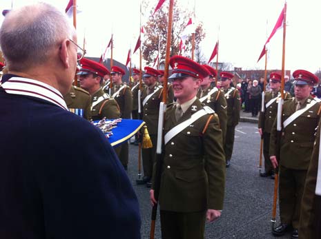 the Deputy Lord Lieutenant of Derbyshire presenting a medal to a young soldier from Chesterfield