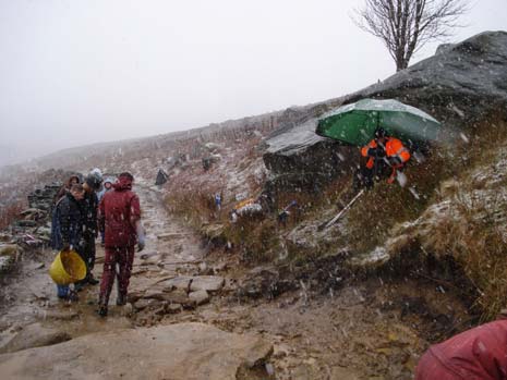 muddy but happy, the team show off their work.