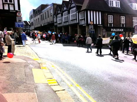 The procession snakes throuhg the town centre