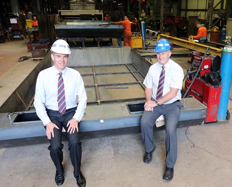 Twigg's director, Richard Tarbatt (left) with Alan Boden overseeing fabrication of the 'skoots'