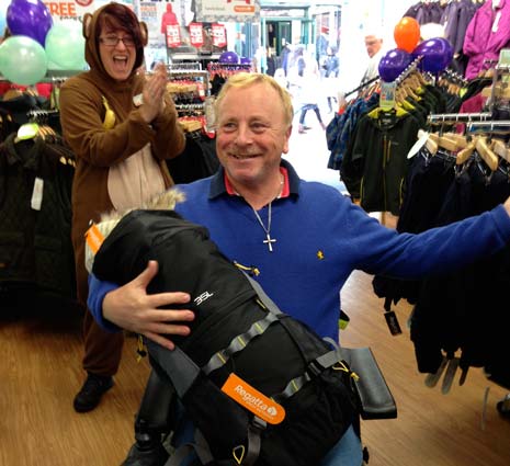 Prior to the launch, the store had run a competition and the winner of that, Tomothy Kay of Bolsover, was on hand to collect his prize - the chance to fill a rucksack with goods from the store in one minute.