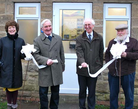 Cllr Willmot (second left) is pictured breaking the loo roll to open the new lavatory block, watched by (l-r) Cllr Christine Brocksopp, Andrew King (representing the Primary Care Trust) and Cllr William Armitage. 