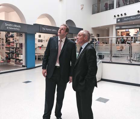 Chesterfield MP Toby Perkins (left) with Bill Grimsey in the new Market Hall during Bill's visit as part of his tour of the East Midlands reviewing the high street