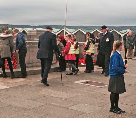 Elderly veterans, some in their nineties, who had braved the windy conditions, left the parade ground to loud applause as the town thanked them for their part in past conflicts