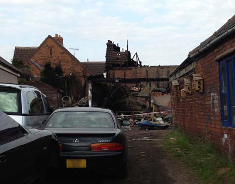 As a result of the fire, debris from an asbestos cement roof fell onto adjoining land