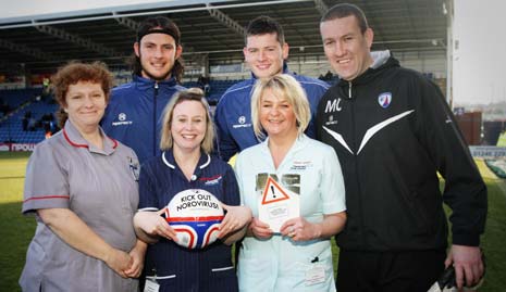 Chesterfield FC and local Nurses supporting the 'Kick out Norovirus' campaign at the B2Net