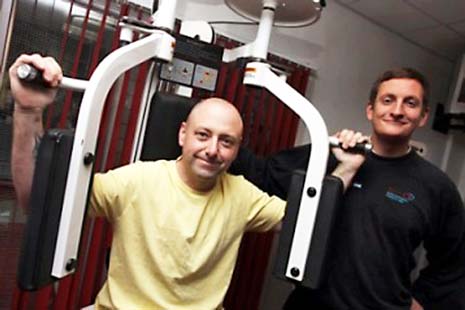 Mark Ward (left) with Michael Price, North East Derbyshire District Council's Assistant Health Referral Officer during a session at Eckington Swimming Pool.