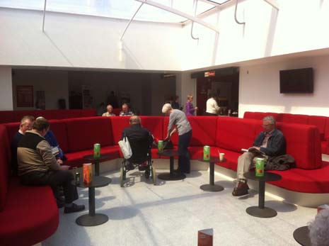 In Reception, there is a lighter ceiling and floor, a much bigger shop and red seating to replace the old lime green ones.