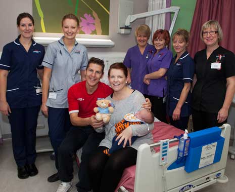 Baby Bobby and his parents and staff - the first baby to be welcomed into the world at the new facility on the 9th November