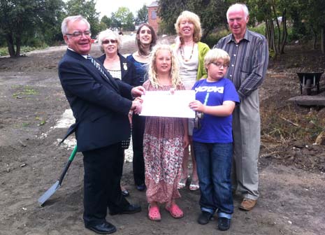 aise Emsell and  Sam Milligan in the Fairplay garden with Former Mayor and Mayoress Cllr Keith and Mrs Pat Morgan , Fundraiser for Fairplay Francesca Redman , Mayor's secretary Vivien Miller and Mayor of Chesterfield Cllr Peter Barr 