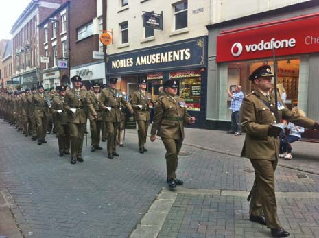 They were applauded and cheered all the way around by shoppers and supporters enjoying the warm sunshine.