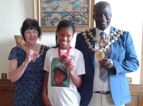 Johanna compares her Commonwealth Bronze 'bling' with the Mayor and Mayoress of Chesterfield