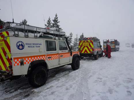 Team members spent two hours clearing the road  to reach a number of vehicles which had become stuck before evacuating four drivers to their base in Hope. 