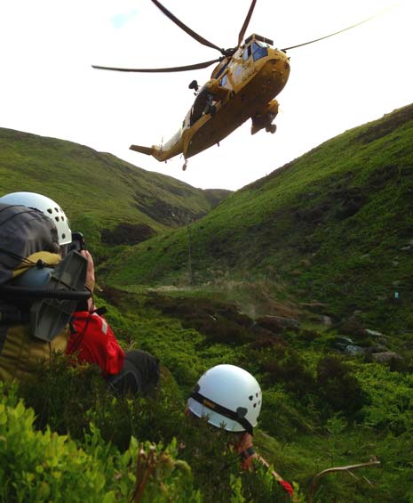 The RAF Sea King Helicopter arrives at Blackden Brook to winch the spinal injury patient to safety and off to hospital in Sheffield
