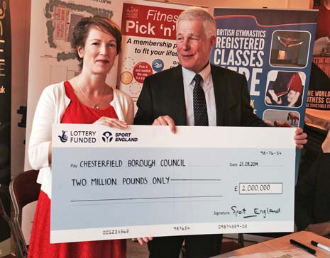 Charles Johnston, Sport England, presents the £2million pound grant cheque to Chesterfield Borough Councillor Amanda Serjeant