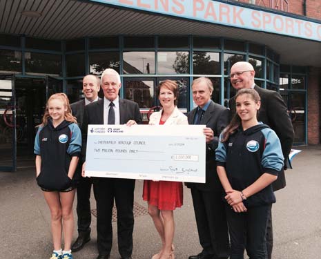 Council Chief Exec Huw Bowen (2nd left) with Charles Johnston, Cllr Amanda Serjeant, Cllr Terry Gilby and Trevor Clay with two members from the Chesterfield Swimming Club