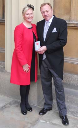 Sgt Stephen Osbaldeston with wife Joanne after receiving his MBE from HRHR the Queen at Buckingham Palace