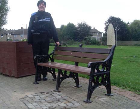 Three park benches have been ripped up, causing damage to the block paved floor beneath, and playground equipment has been damaged by fire. 