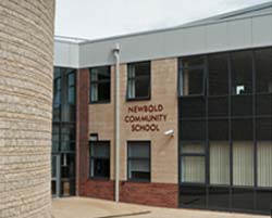 An action plan has been put in place to improve standards at Newbold Community School following a visit by Government education inspectors.