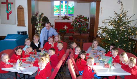 Children from Stretton Handley C of E school move in to St Mark's Church.