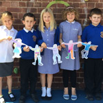 Paper Children Reach Out Around The World