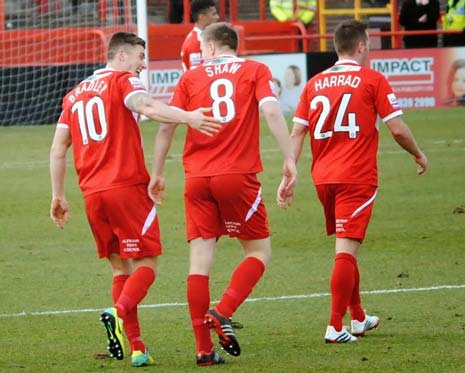 Tom Shaw is congratulated by team-mates after his equaliser for Alfreton