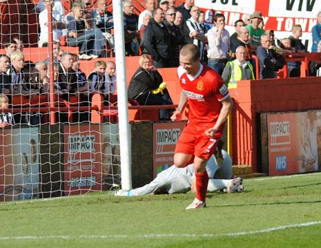 Akinde's quick return pass allowed Law to spray the ball out wide to Meadows, and his cross saw Grimsby defender Sam Hatton inadvertently tee it up under pressure from Paul Clayton for Law to finish the move by lashing the ball into the roof of the net from 12 yards.