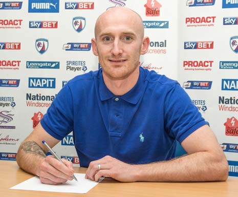 Long-serving defender Drew Talbot has committed his future to Chesterfield by signing a new one-year contract.