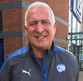 Chesterfield manager Gary Caldwell has strengthened his backroom team with the appointment of Graham Barrow as assistant-manager/chief scout.