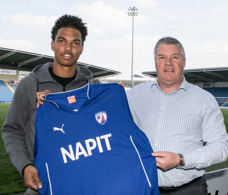 New striker Rai Simons with Chesterfield CEO, Chris Turner