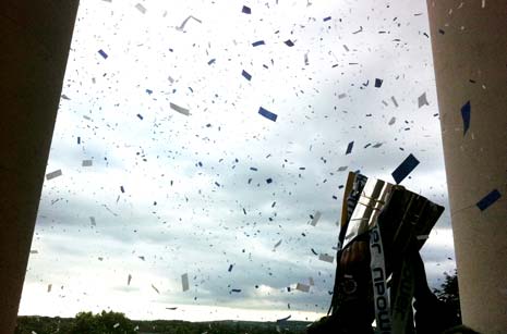 The trophy was held aloft to a shower of ticker tape