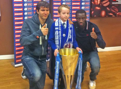 Jack Mitchell is 8 and had his photo taken with Jimmy Juan and Alex Mendy