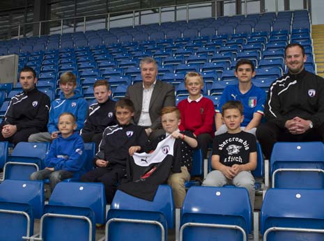 Back row, from left to right: Darren Molloy (Chesterfield FC Academy Coach), Connor Emery, Ryan Evans, Chris Turner (Chesterfield FC Chief Executive), Finlay Smith and Marcus Calderone. Front row, from left to right: Leighton Bowering, Fabian Oud, Bailey Smedley and Sam Sheppa