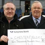 Chesterfield FC Supporters Club hand over a cheque for £10,000 to Chairman Barrie Hubbard