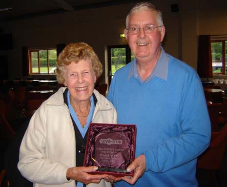 Matlock Committee Member Hazel West receives her award from League Vice Chairman and MTFC Club Secretary, Keith Brown