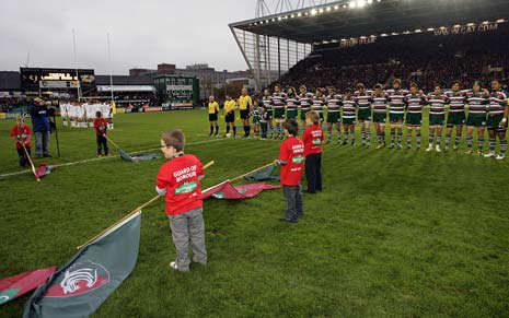 Lowering their flags for the minutes silence