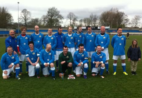 The Tesco team line up ready to face Arsenal Charity Team